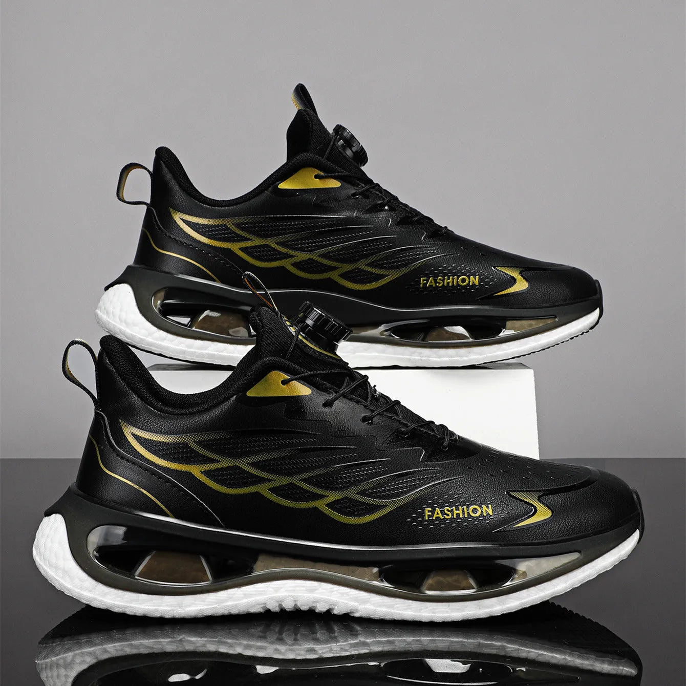 Men's low-top button sneaker with rotating sole in black mesh or leather options on a plain background.