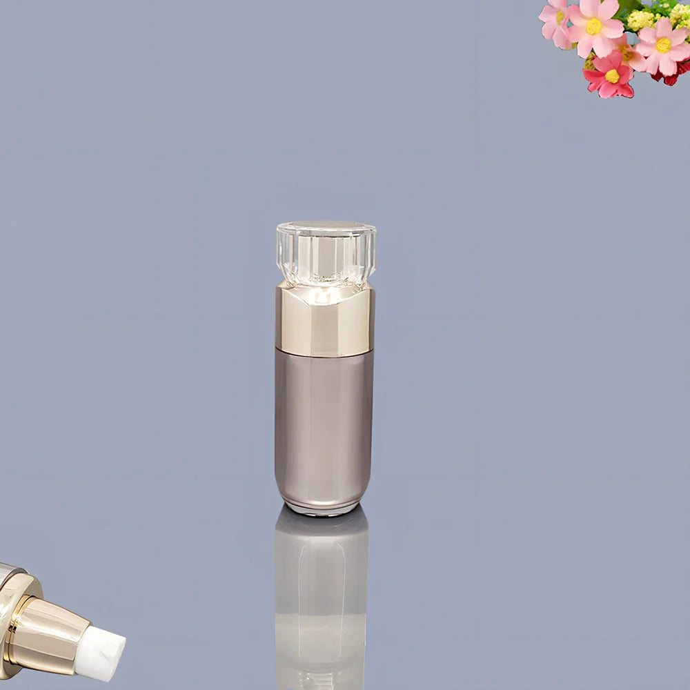 Acrylic cosmetics bottles in champagne gold and brushed white with vacuum sealing, various sizes from 5g to 120ml