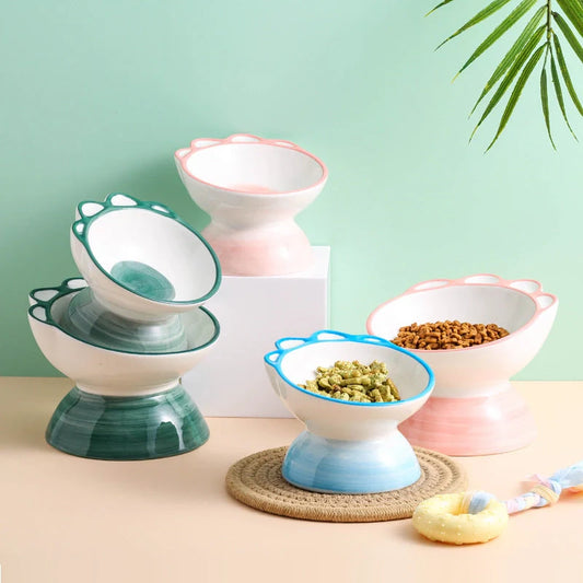 Ceramic oblique pet bowl with cartoon paw design for dogs