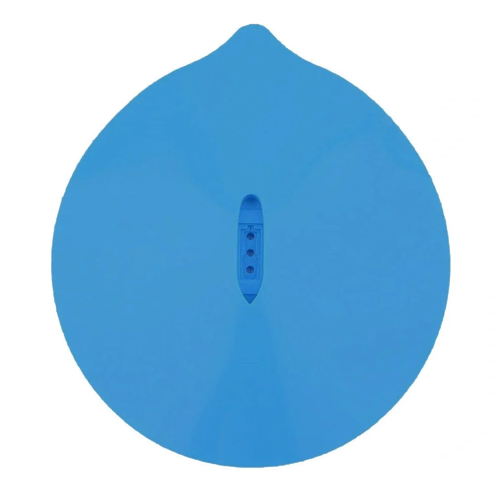 Blue silicone steamer lid measuring 26x25cm on kitchen bowl creating airtight seal for cooking