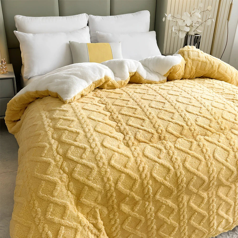 Double quilted plush quilt in sapphire blue showing detailed stitching and German velvet texture