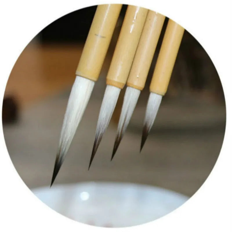 Writing brush lower case thin gold body wolf wool hook thread calligraphy brush set in pine branch design, comprising four mixed-hair brushes suitable for traditional Chinese calligraphy and ink painting with varied brush tip specifications