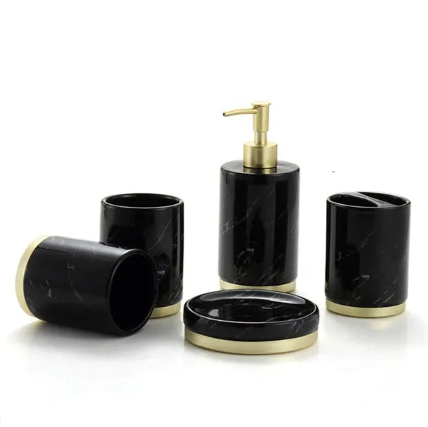 Ceramic bathroom set with bright glaze showing emulsion bottle, cup, toothbrush holder and soap dish
