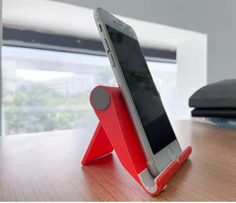 Adjustable PE folding mobile phone stand in various colors for secure device viewing