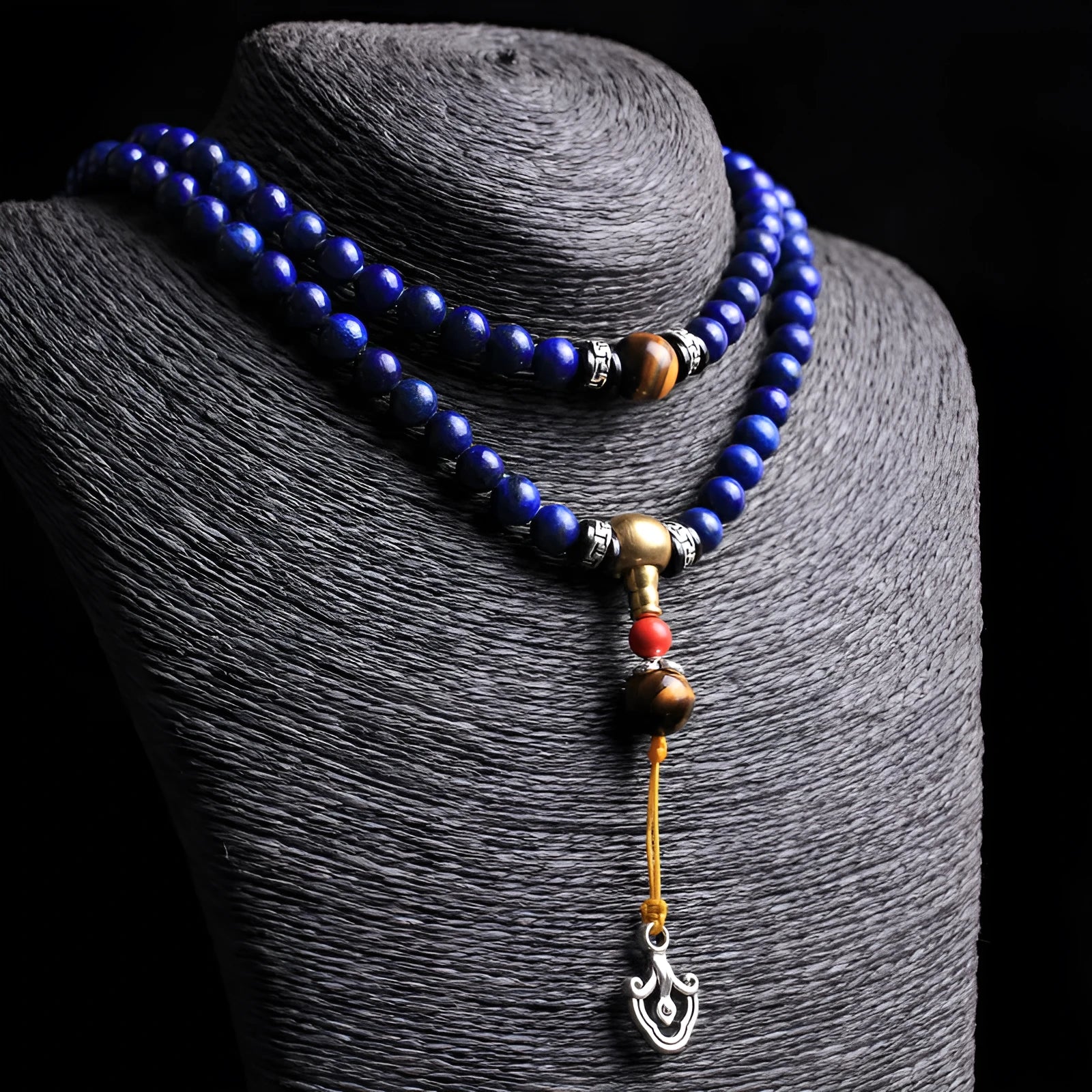 Natural lapis lazuli 108 bead bracelet with zodiac animal modelling in blue stone with gold flecks