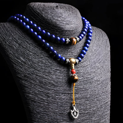 Natural lapis lazuli 108 bead bracelet with zodiac animal modelling in blue stone with gold flecks