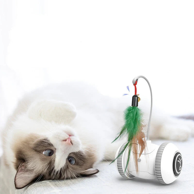 Interactive robotic cat toy with feather and plush chick heads for endless feline entertainment