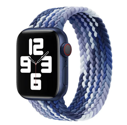 Apple Watch with elastic braided nylon strap in single-loop design showing stretch capability