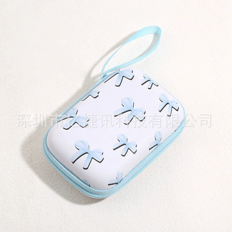 Square hard shell EVA cable storage bag with zipper, 11x8x4cm dimensions, showing Bunny Plaid design variant