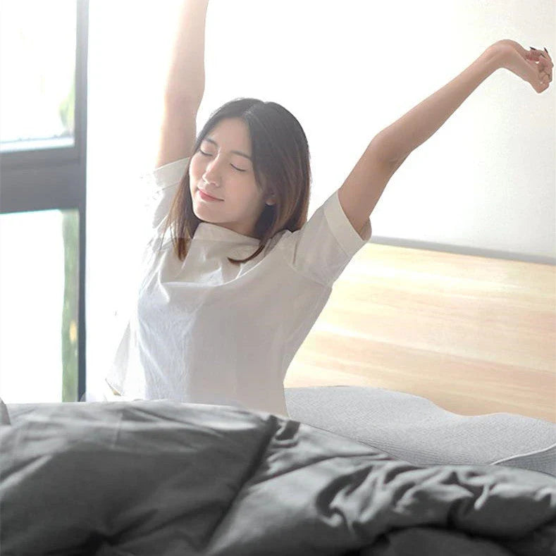 Premium memory foam neck massage pillow with adjustable loft and breathable knitted cotton cover for comfortable, pain-relieving sleep