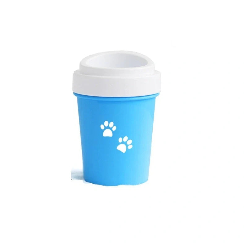 Silicone dog paw cleaner cup in blue, green, or pink with soft bristles for washing muddy paws
