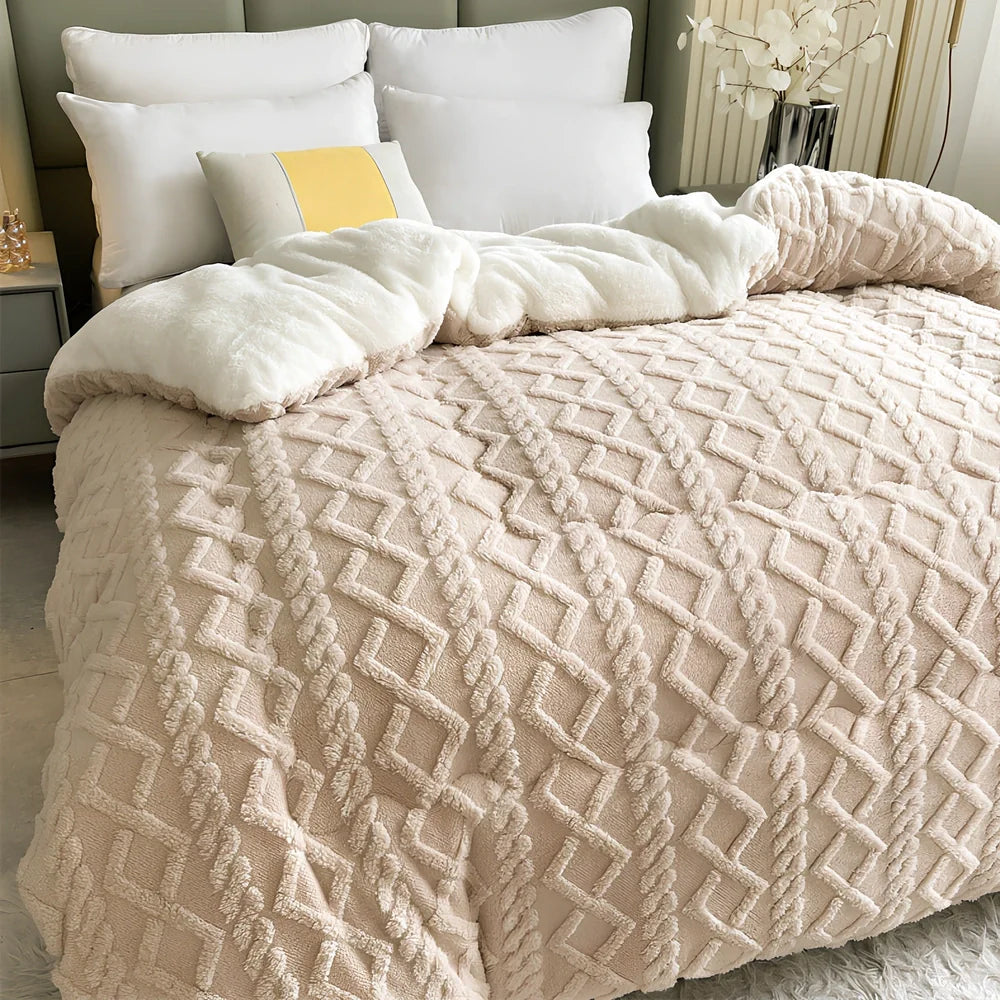 Double quilted plush quilt in sapphire blue showing detailed stitching and German velvet texture