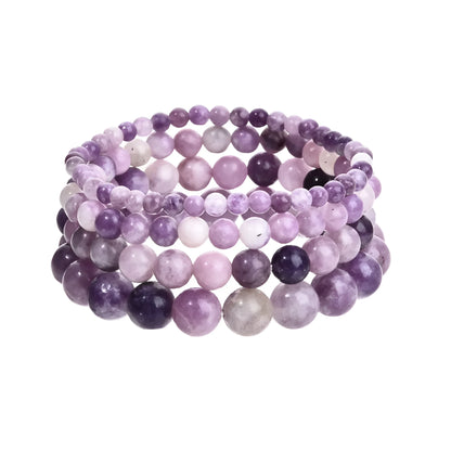 Purple geometric stone bead bracelet on an elastic band, showing manual craftsmanship.