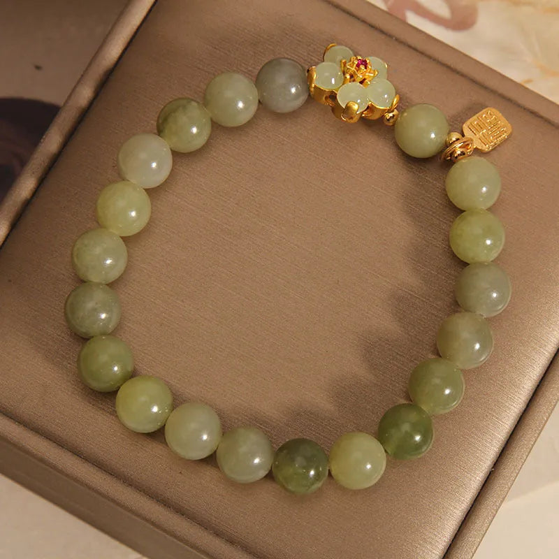 Women's casual bracelet with a grey jade stone set in an alloy metal band.