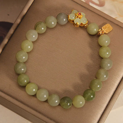 Women's casual bracelet with a grey jade stone set in an alloy metal band.