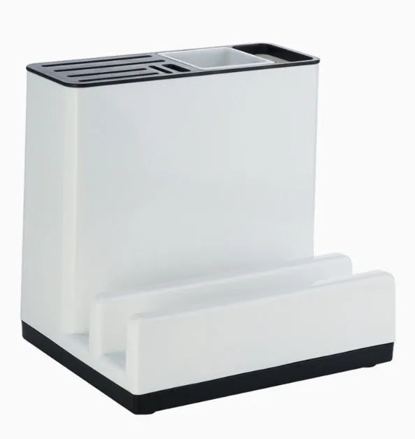 White plastic desktop kitchen knife storage rack with integrated shelf and individual partitions.