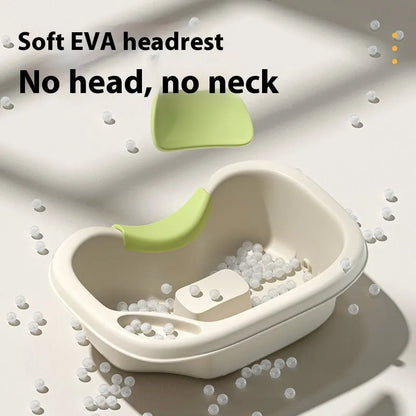 Portable plastic shampoo basin with neck pillow and water pump for bed hair washing.