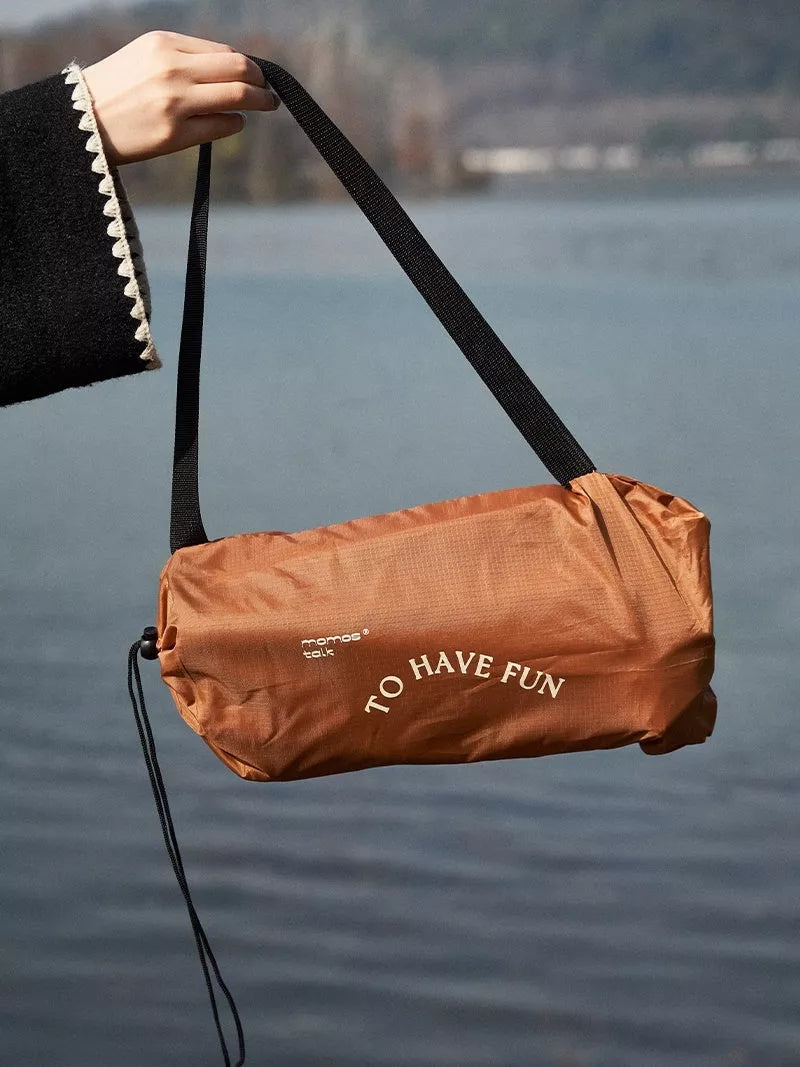 Portable inflatable sofa for outdoor camping, durable and waterproof, supports 150kg