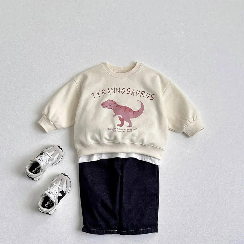 Children's beige sweatshirt with printed cartoon dinosaur design, pullover style without hood