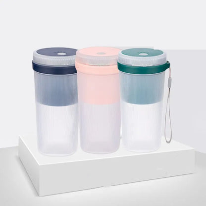 Portable USB rechargeable blender cup in blue, green, or pink with 300ml capacity and detachable blades