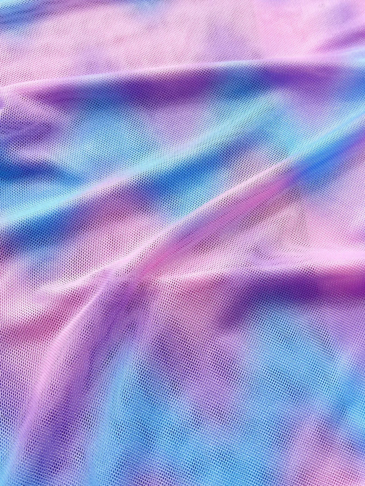 Women's split tie-dye bikini set with skirt, bra, and panties in pictured colour