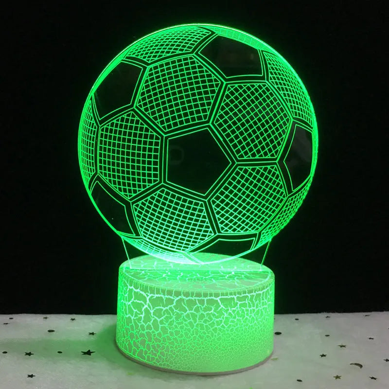 3D football-shaped LED night light showing colourful gradient illumination on a dark background