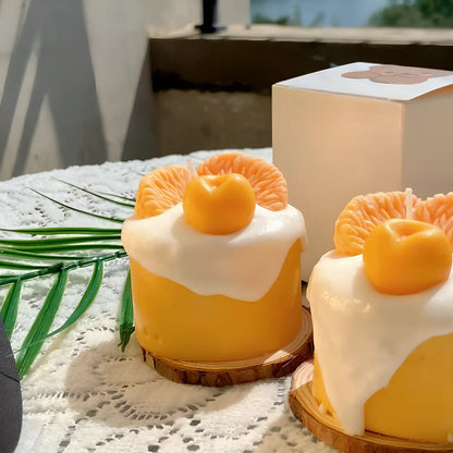 Handmade orange soy wax candle with 5cm diameter and 6cm height in cylindrical shape