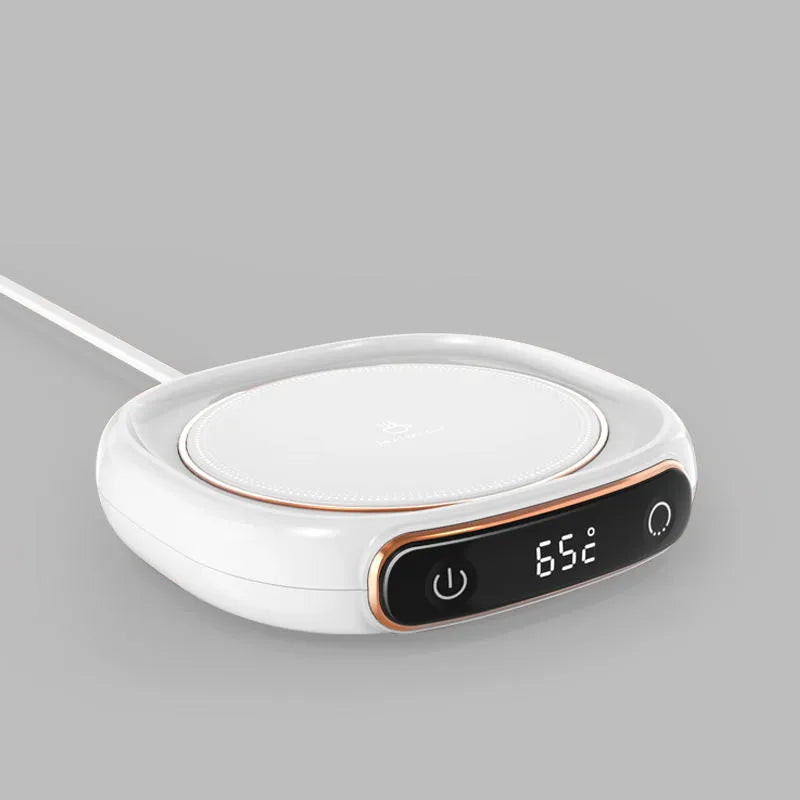 White USB coffee mug warmer heating pad on wooden desk