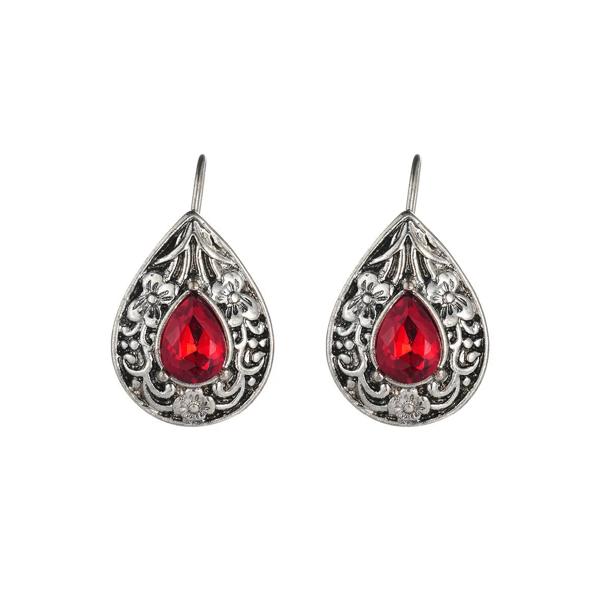 Pair of retro Bohemian carved drop earrings in red alloy for women, shown as a single pair