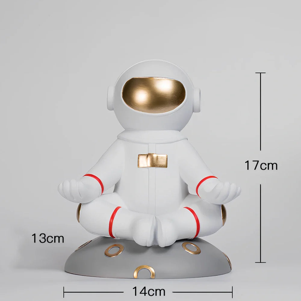 Hand-carved resin astronaut decoration in red or white with handstand, meditate, or skateboard poses