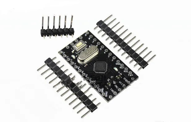Mini Pro microcontroller circuit board measuring 33.3mm by 18.0mm with pin headers and Atmega328P chip