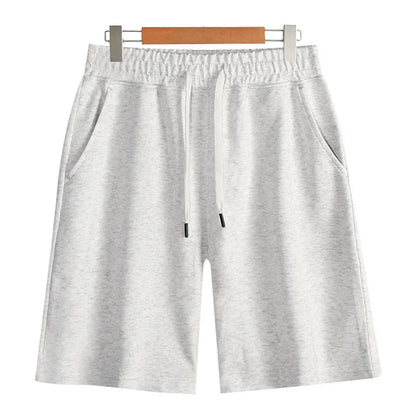 Men's straight-leg cotton casual shorts in light grey on a plain background.