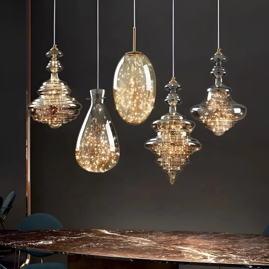 Modern adjustable glass droplight chandelier with LED lighting on a long suspension cable.