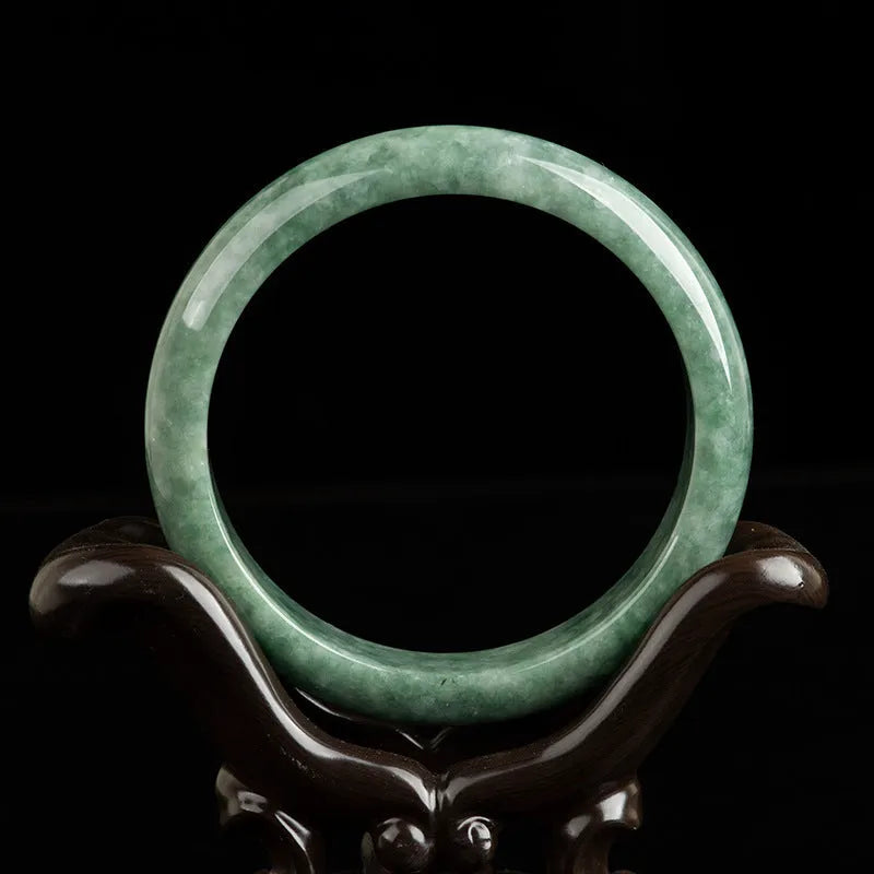 Natural emerald bean green simple ring bracelet for women on a gift box.