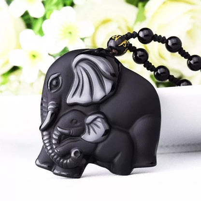Hand-carved obsidian elephant pendant necklace with stretch bead chain for wealth and protection