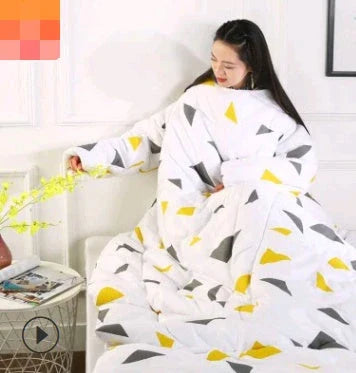 Cozy fleece blanket with sleeves in various colors, perfect for relaxing and enjoying indoor activities