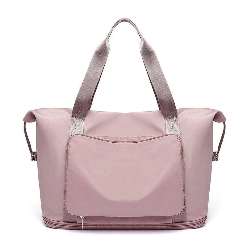 Roomy and foldable gym bag for women with waterproof Oxford fabric, multiple pockets, and wet/dry separation compartment