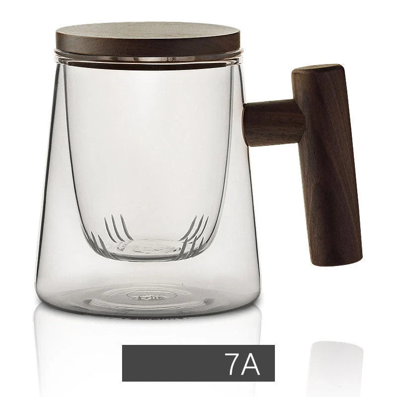 Premium glass tea infuser cup with wooden handle, offering a unique tea-water separation system and temperature-resistant construction for a refined tea experience.