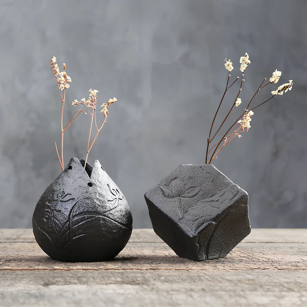 Handmade stoneware Zen Chinese flower arrangement vase with floating lotus device on wooden table