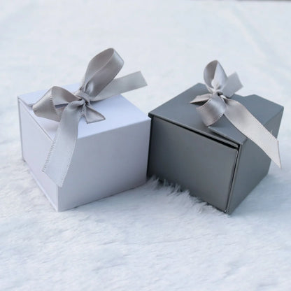 Square grey jewellery gift box with ribbon bow measuring 5x5cm for ring and earring storage