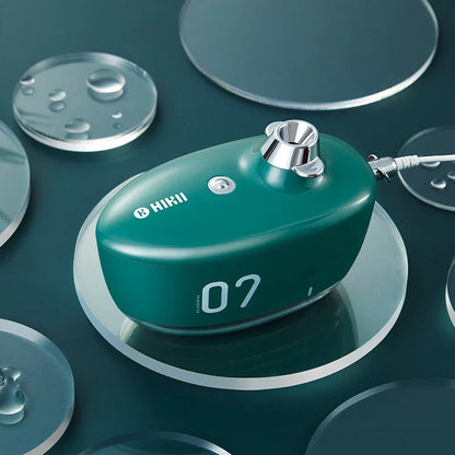 Compact, USB-powered portable air humidifier with discreet night light and silent operation for improved air quality and comfort