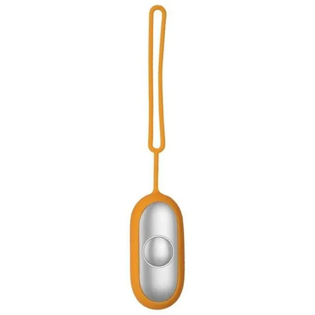 Hand-held micro-current sleep aid device in grey, green, and orange colour options