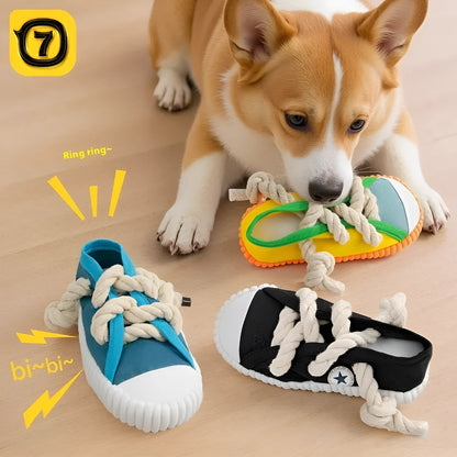 Durable plastic dog chew toy in slipper shape with bends, in yellow, black, or blue.