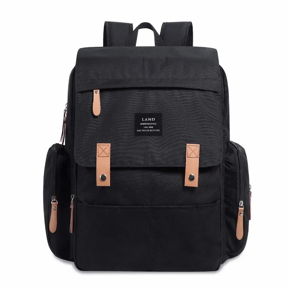 LAND Mommy large grey diaper backpack with changing mat, shown as a travel nappy bag.