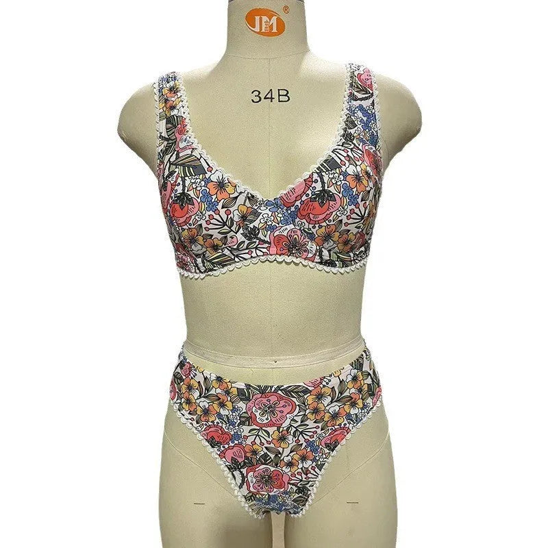 Women's floral print bikini with high waist briefs and adjustable ties.