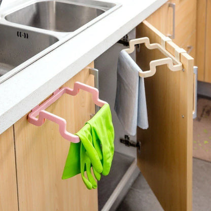 Eco-friendly over-the-door trash bag holder in various colors for organized kitchen storage