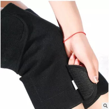 Black warm knee pads with double-sided heating for cold weather comfort