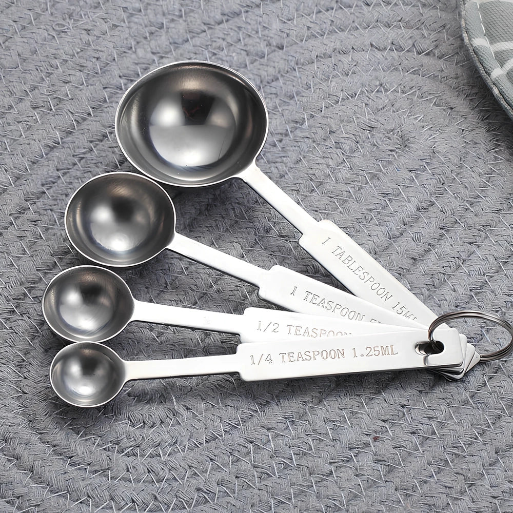 Stainless steel measuring spoon and cup set with eight pieces in silver finish