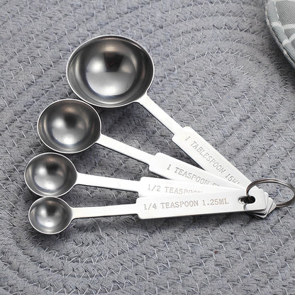 Stainless steel measuring spoon and cup set with eight pieces in silver finish