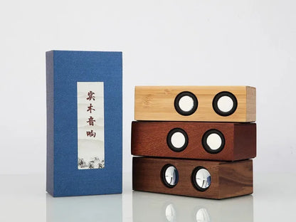 Retro-style wooden Bluetooth speaker in a choice of bamboo, black walnut, or sapele wood finishes.